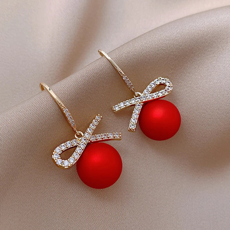 Brincos Luxuosos de Zircônia com Laço e Pérola