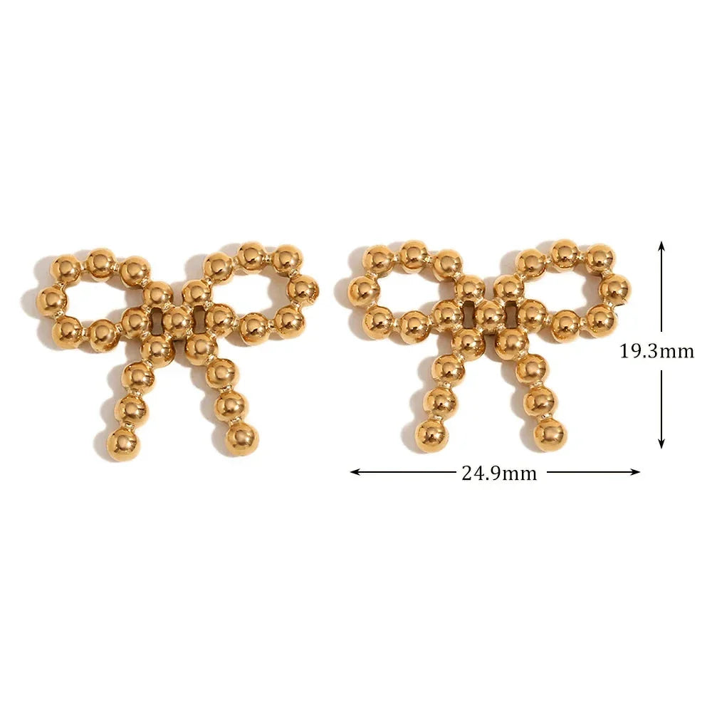 Brincos Elegantes de Laço com Pérolas Douradas