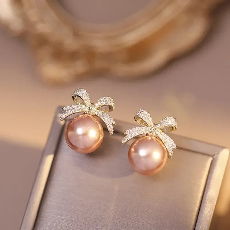Brincos Femininos Bow Pearl TT - Elegância e Charme