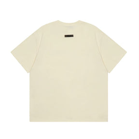 Camiseta Fear of God Essentials Egg Shell