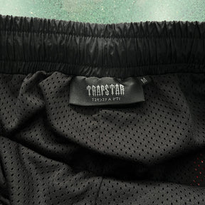 Conjuto Trapstar Irongate 2.0 Shellsuit Vermelho Preto