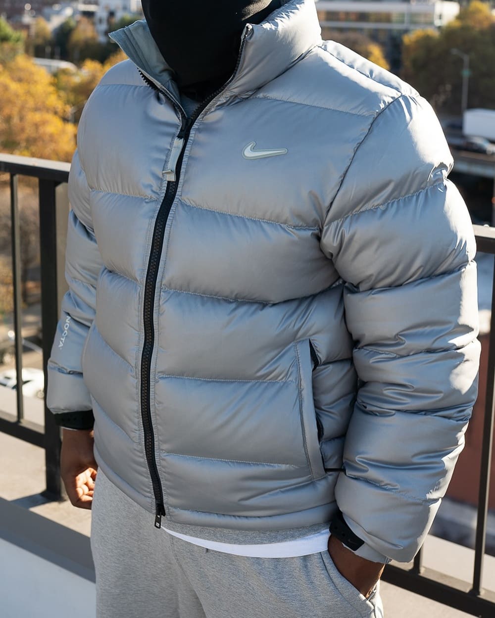 Jaqueta Puffer Nike NOCTA Cinza