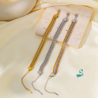 Pulseira Dourada Três Correntes Torcidas - Loja Burnetts
