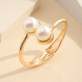 Pulseira Elegante com Pérolas Barrocas Douradas