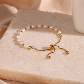 Pulseira Elegante de Pérolas e Aço Inoxidável Burnetts Joias