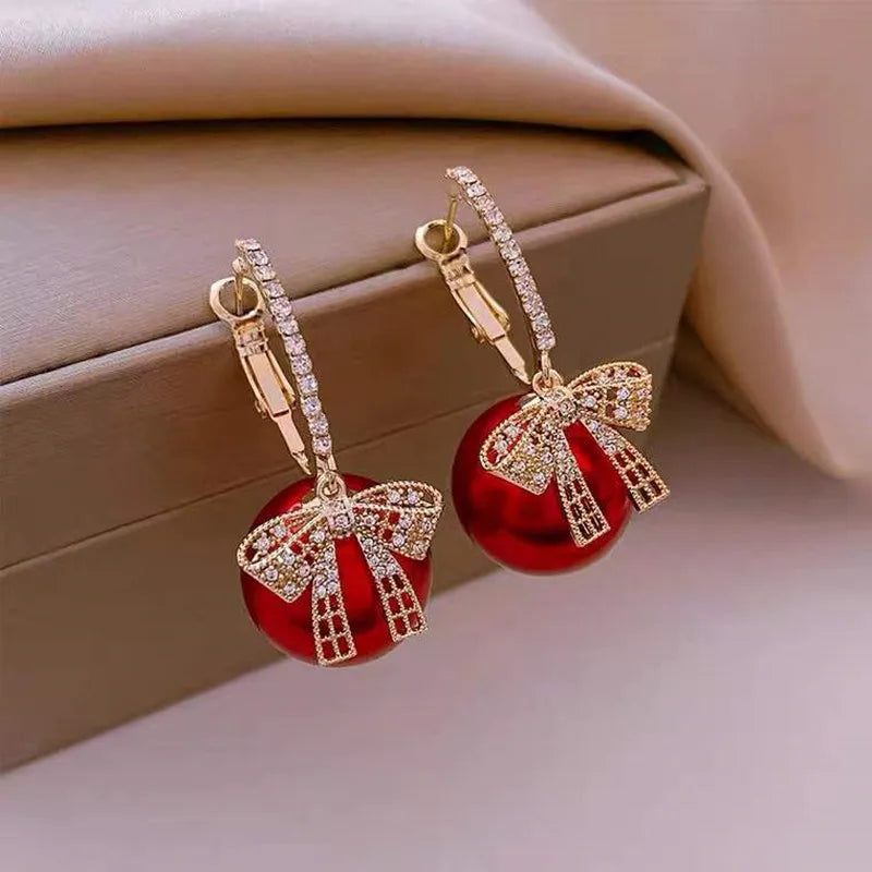 Brincos Luxuosos de Zircônia com Laço e Pérola