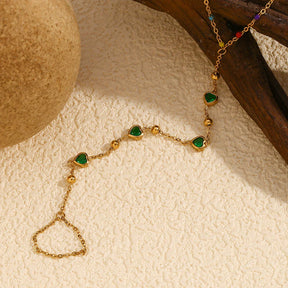 Pulseira de Mão com Corações Verdes e Zircônias Coloridas
