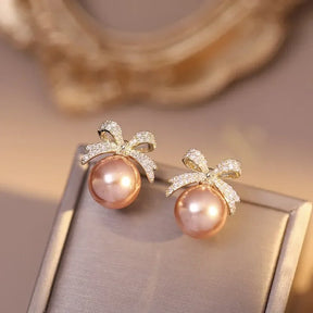 Brincos Femininos Bow Pearl TT - Elegância e Charme