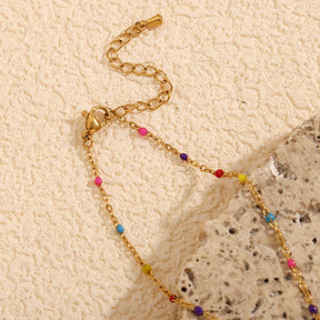 Pulseira de Mão com Corações Verdes e Zircônias Coloridas