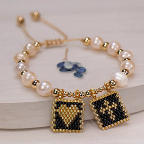 Pulseira de Pérolas com Coração e Cruz Boho