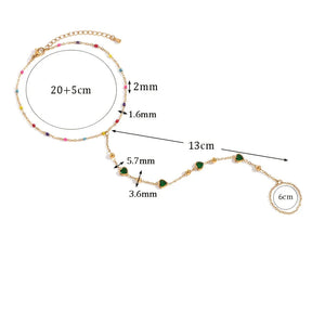 Pulseira de Mão com Corações Verdes e Zircônias Coloridas