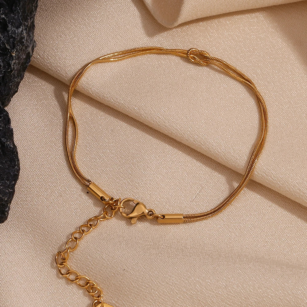 Pulseira Dupla Burnetts Joias: Elegância em Aço Inoxidável