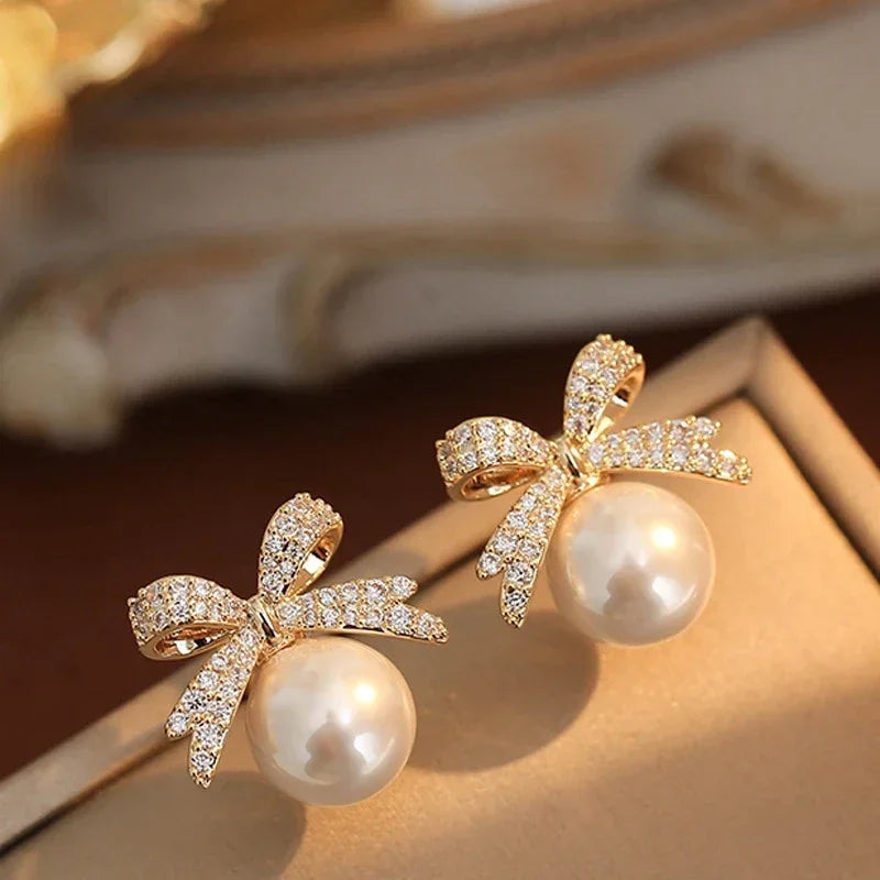 Brincos Femininos Bow Pearl TT - Elegância e Charme