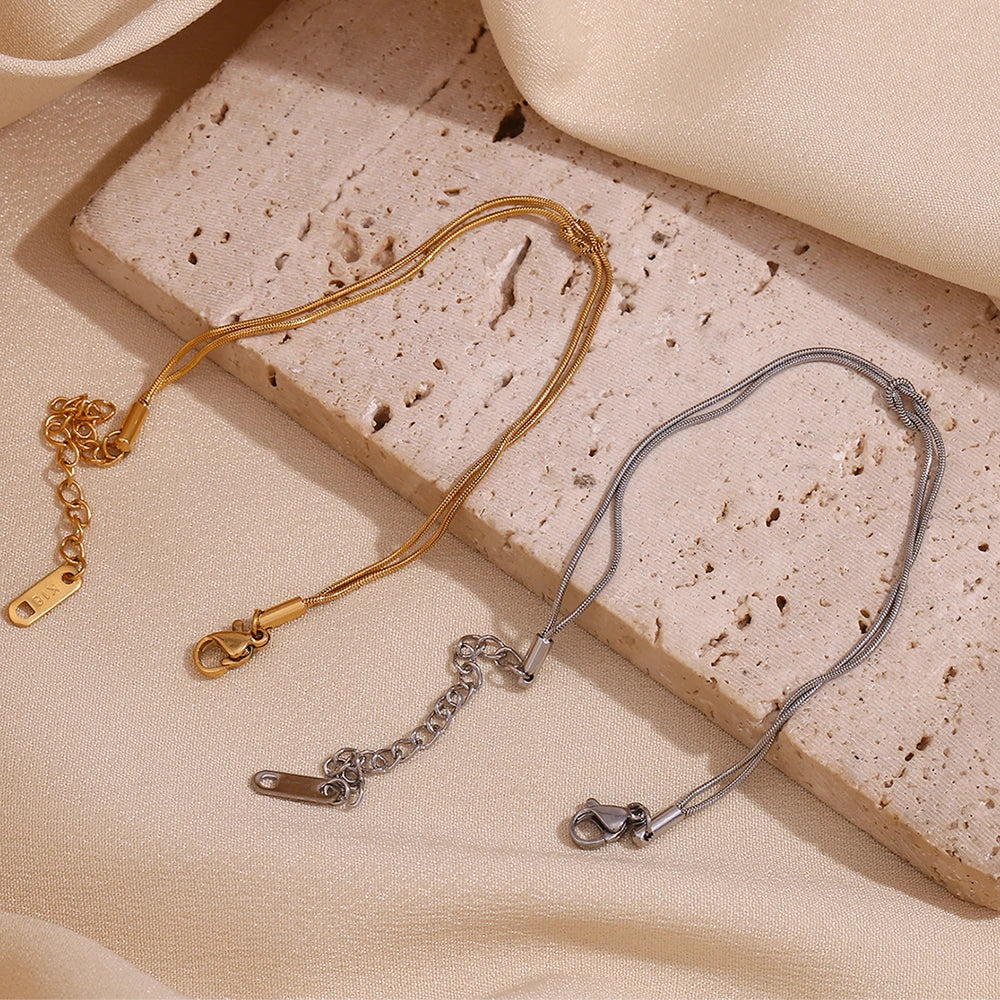 Pulseira Dupla Burnetts Joias: Elegância em Aço Inoxidável