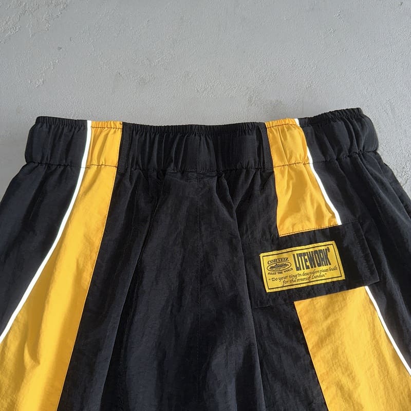 Shorts Corteiz Preto Amarelo