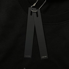 Camiseta Amiri Staggered Logo Preto