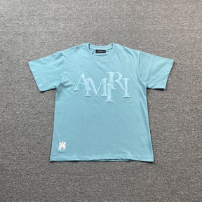 Camiseta Amiri Staggered Logo Azul