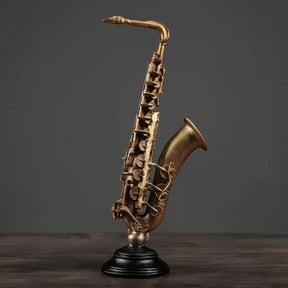 Ornamento Decorativo Instrumentos Dourados Violino e Saxofone