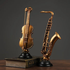 Ornamento Decorativo Instrumentos Dourados Violino e Saxofone